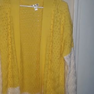 A yellow and white cardigan